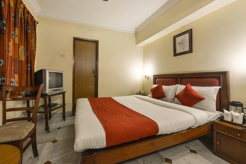 Camac Plaza Hotel Calcutá Quarto foto