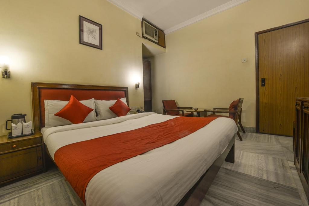 Camac Plaza Hotel Calcutá Quarto foto