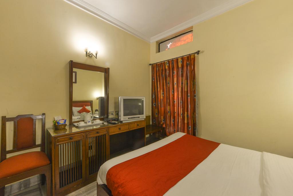 Camac Plaza Hotel Calcutá Quarto foto